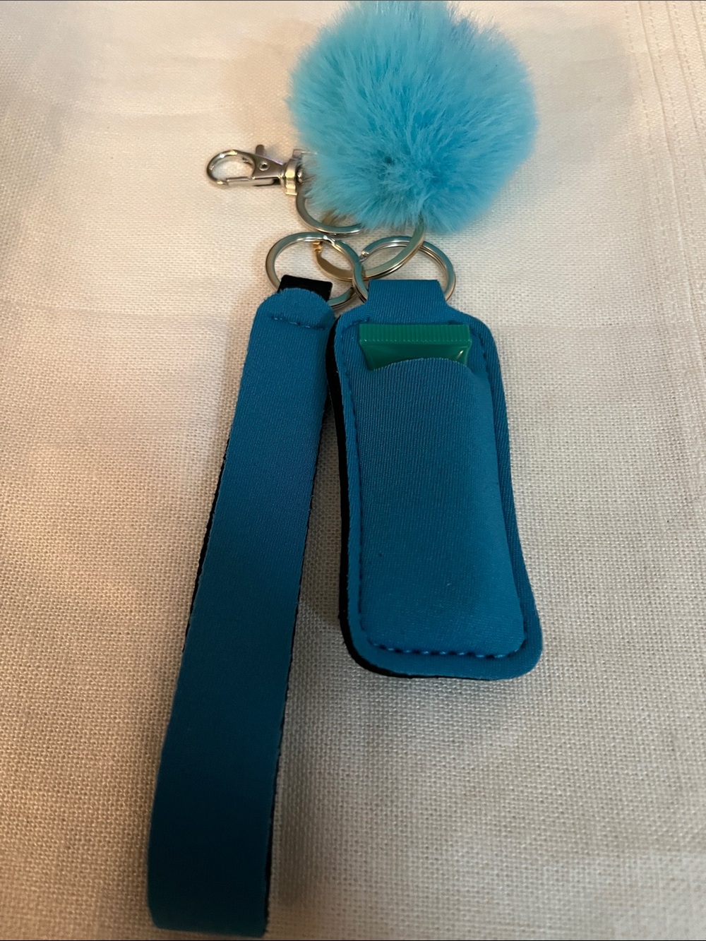 Blue Pom Pom Keychain & Lip Balm Holder Wristlet